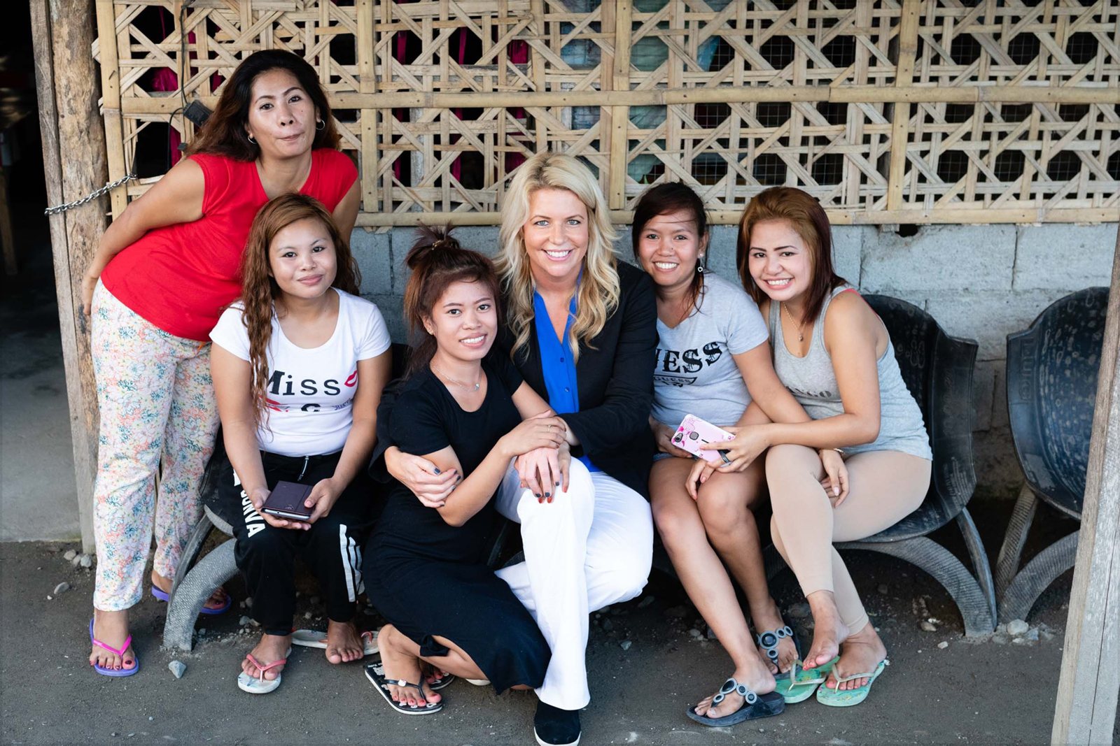 Erica Hazlett with women in a village community