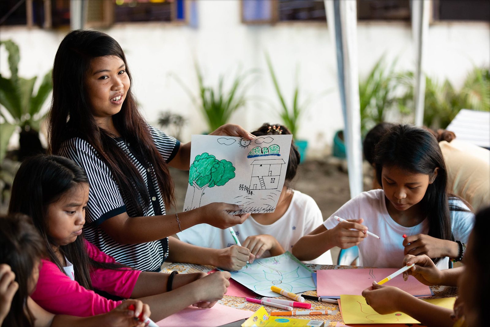 Children drawing together