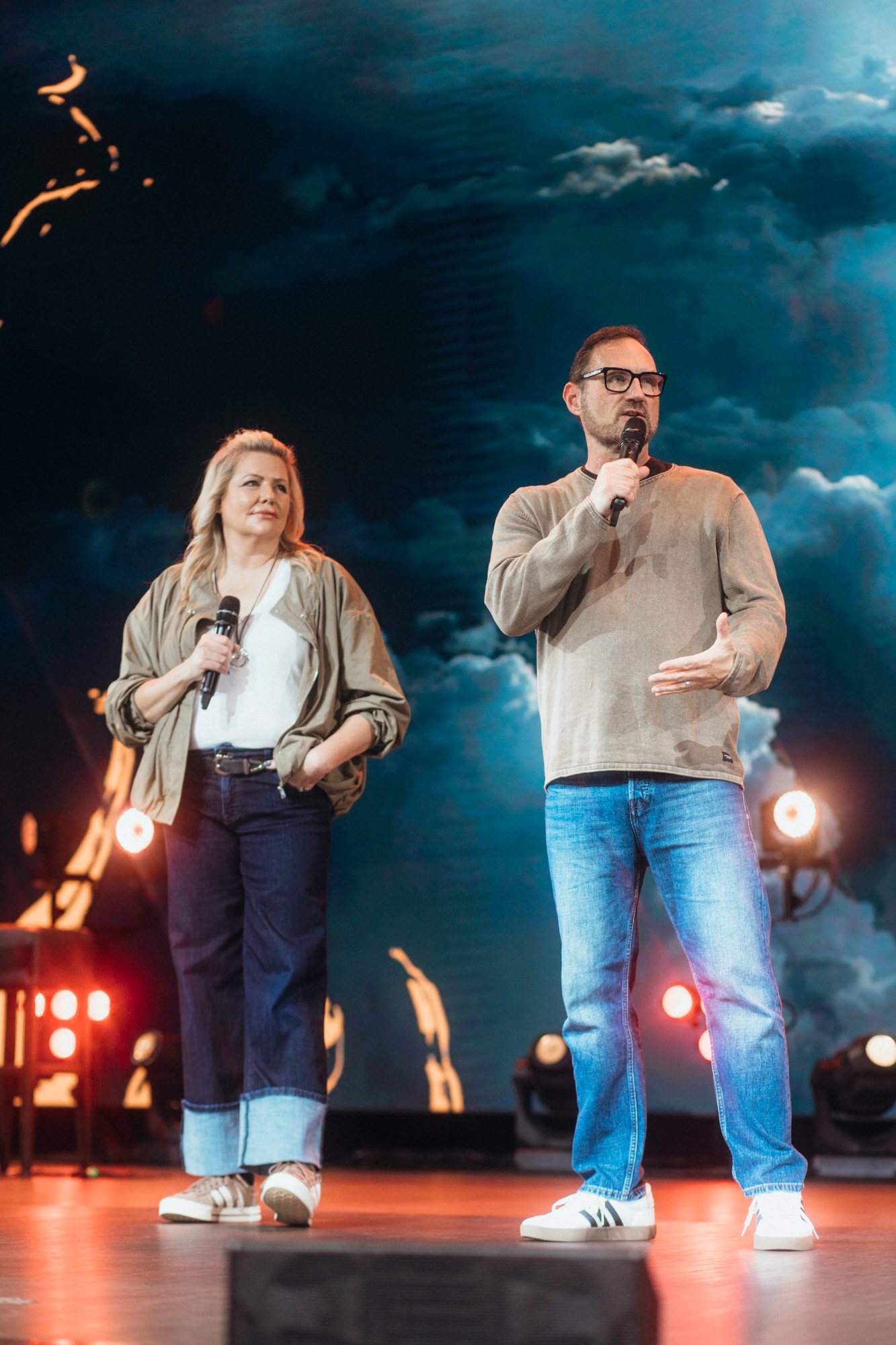 Bob and Erica Hazlett speaking on stage